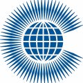 The Commonwealth logo, featured on the Commonwealth flag, is a golden globe encircled by stylized spears that form a "C" shape, all on a blue background. The spears do not represent the number of member countries but symbolize the diverse aspects of cooperation within the Commonwealth. The design was adopted in 1973, with the globe representing the global nature of the organization, and the spears signifying the various ways the Commonwealth works together